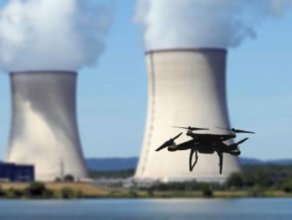 Small drone flying near a power station
